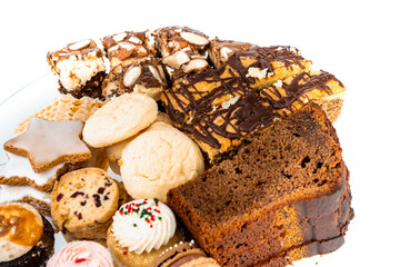 Collection of sweet treats on a white background. Baked goods presentation concept.
