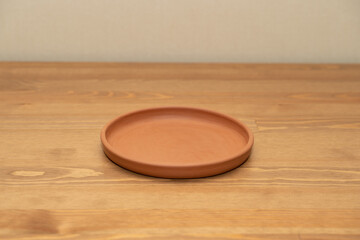 Ceramics, a ceramic product made with their own hands on a potter's wheel.