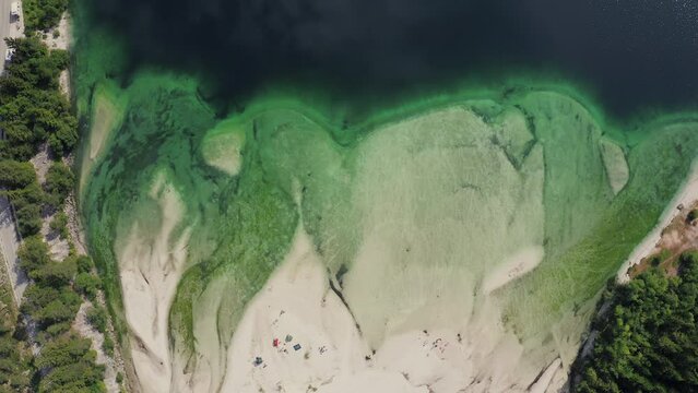 Aerial top down of dry alpine river delta. Lago Del Predil, Italy, Alps, Europe.