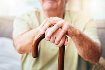 Elderly man, hands and walking stick for disability or old age, retirement and nursing home with senior care. Old man relax with wood cane for walking support, osteoporosis and arthritis.