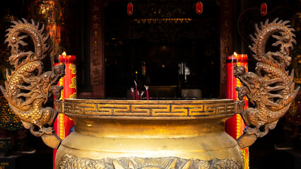 Praying place with incense in Chinese temple. Chinese New Year concept background image
