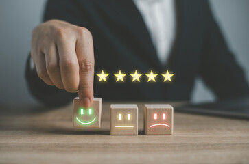 User give rating to service experience on online application for Customer review satisfaction feedback survey concept..