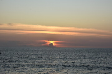 Fototapeta premium sunset over the sea in varkala beach, India