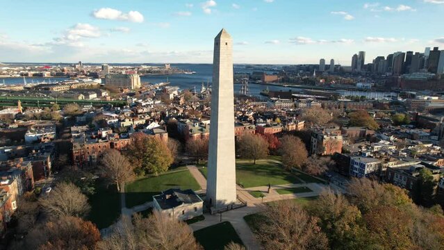 Aerial View of Bunker Hill Monument, Boston, Massachusetts USA. Granite Obelisk and Cityscape in Background