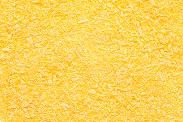 Food background of yellow breadcrumbs