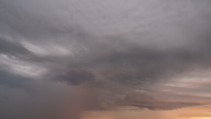 Fototapeta na wymiar Detail shot of epic storm clouds during sunrise