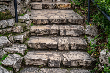 A stone staircase leads to the top of a hill