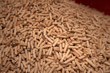 Flatlay of wood pellet. Macro shot of renewable and sustainable fuel. Pellet 6mm rolls is a byproduct of the wood industry