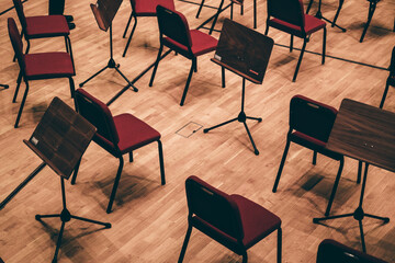 Indoor concert background abstract symmetry seats chairs seating in concert hall watching...