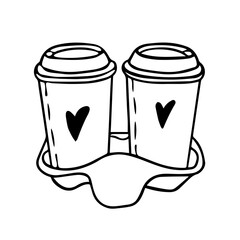 Two cups of coffee on a cardboard