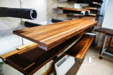 Lacquered furniture parts are dried in a small furniture production. Selective focus. Foreground