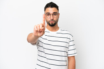 Young Arab handsome man isolated on white background counting one with serious expression