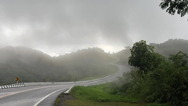 View of street number 3 The famous beautiful road in Nan province. In the rainy season, it is covered with fog.	