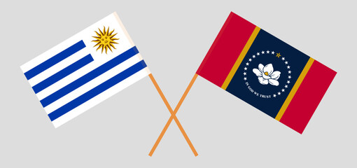 Crossed flags of Uruguay and The State of Mississippi. Official colors. Correct proportion