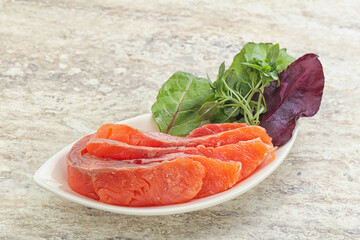 Sliced salmon fillet starter snack