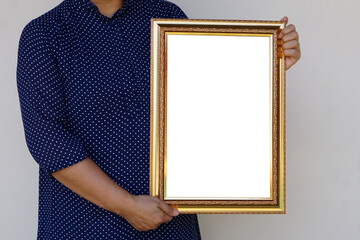 Closeup woman holds empty photo frame or blank diploma certificate frame. Copy space for adding...