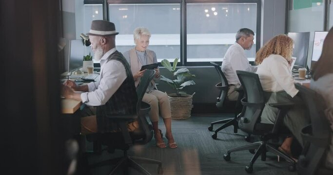 Business people, communication and team with diversity in workplace, coworking space and collaboration with tablet. Excited senior employee, talking and news with networking, productivity and review