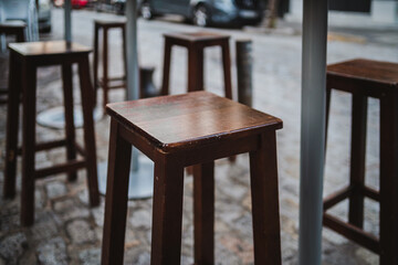 Close up shot of a bar stool outdoors in a bar in Spain