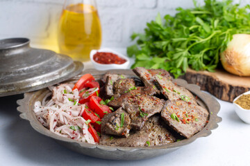 Traditional Turkish Liver kebab cuisine. Leaf Liver spicy. Delicious turkish ciger. (Turkish name; yaprak ciger)