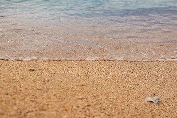small waves and sandy beach 