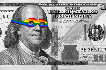 Portrait of Benjamin Franklin wearing a mask in the colors of the LGBT flag on a hundred dollar...