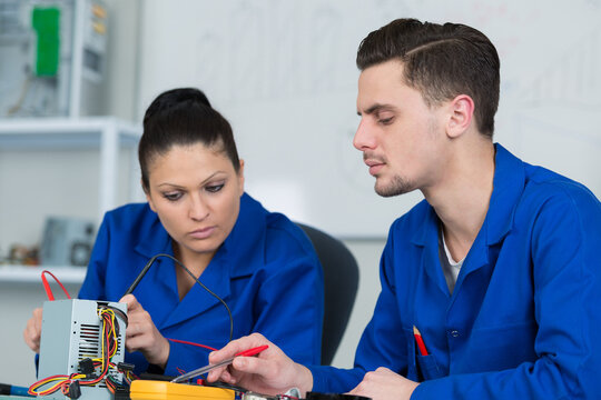 students in electronics class at university