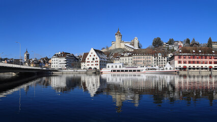 Panorama of the Swiss old town Schaffhausen in winter, with the medieval castle Munot over the Rhine river. Munot is the landmark of this town.