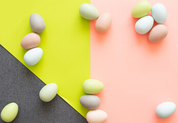 Easter banner with colorful eggs and tulip flowers on bright green background.