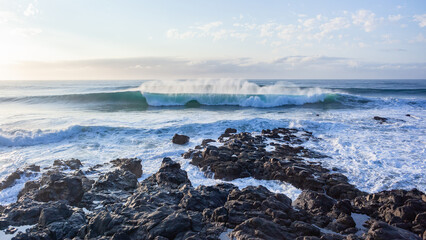 Ocean Waves Spray Crashing Breaking Overlooking Horizon Rocky Coastline.