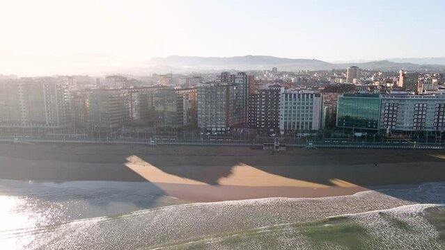 Aerial View of  buildings from a spanish city with beach and sea