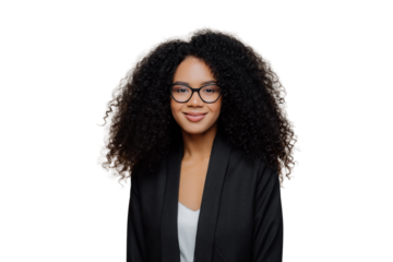 Portrait of beautiful Afro American woman with crisp hair, dressed in elegant black jacket, transparent glasses, looks directly at camera with gentle smile wears optical glasses isolated on brown wall