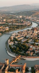 Obraz premium Aerial view of verona during sunset, aerial view of italian city during sunrise