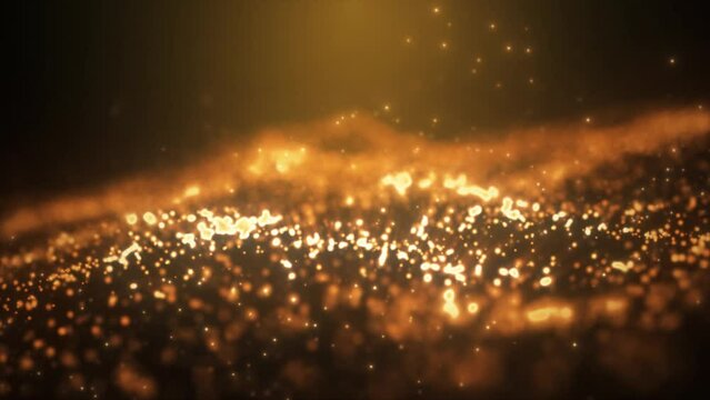 Abstract yellow orange gold glowing energy waves from particles and dots magical with blur effect on dark background. Abstract background. Video in high quality 4k, motion design