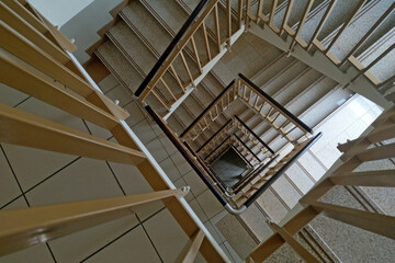 Top view of the stairs in the building. Apartment house.