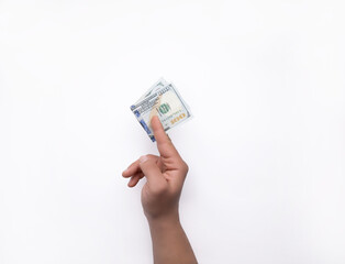 hand holding money on white background. 100 dollars