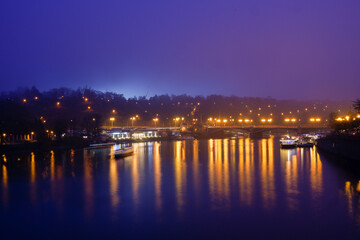 Čechův most in foggy evening
