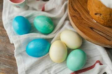 Easter eggs colored in Ukrainian style like Ukrainian flag yellow and blue colors. Easter symbols top view