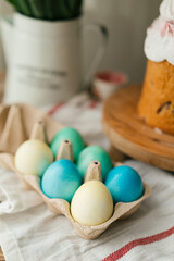 Easter eggs colored in Ukrainian style like Ukrainian flag yellow and blue colors. Easter symbols top view