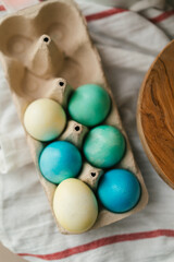 Easter eggs colored in Ukrainian style like Ukrainian flag yellow and blue colors. Easter symbols top view