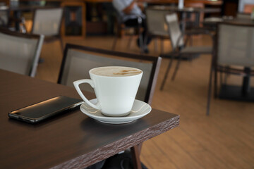 Cup of coffee on the table