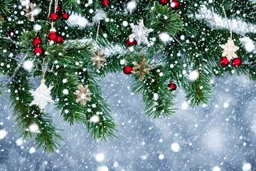 Naklejka na ściany i meble Christmas tree branches falling snow, Background, generative ai