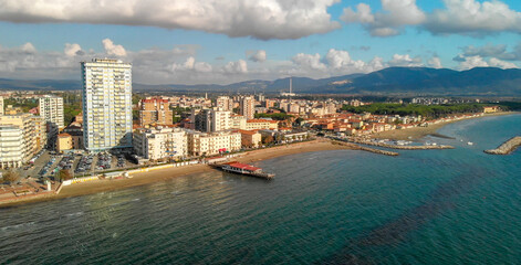Panoramic aerial view of Follonica, Italy. Coastline of Tuscany with town and ocean