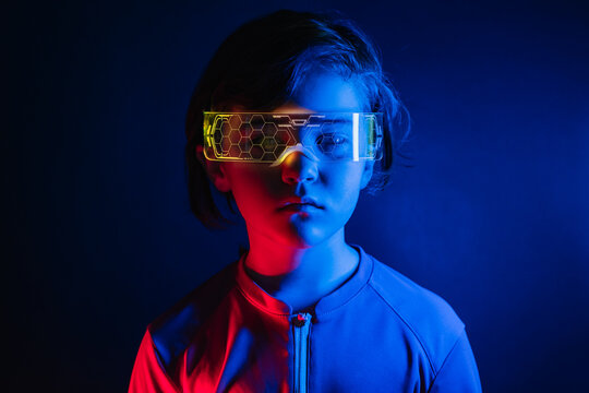 Modern child in futuristic glasses