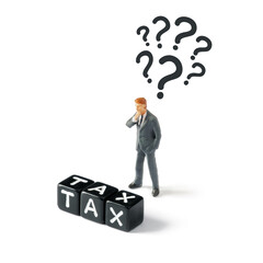 A businessman figurine with question mark above his  head looking at cubes with tax word on white background.