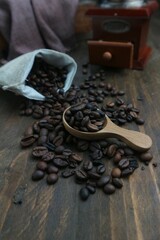 roasted coffee beans on a wooden table