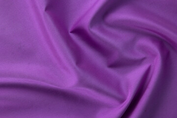 3 smooth purple cotton Texture, curved silk background, pattern. Texture of purple silk fabric. Beautiful emerald soft silk.