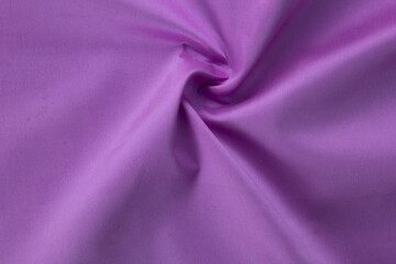 7 smooth purple cotton Texture, curved silk background, pattern. Texture of purple silk fabric. Beautiful emerald soft silk.