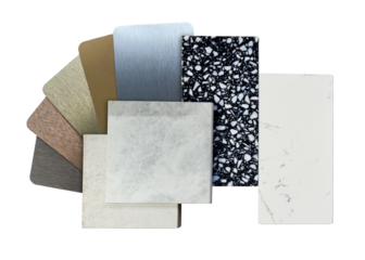 top view of interior material samples contains grey tiles, black and white terrazzo stone, white marble quartz, multi color of brushed stainless isolated on background with clipping path.