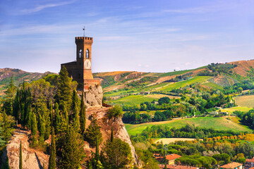 Brisighella clock tower on the cliff. Emilia Romagna, Italy. - 557438416