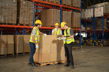 Teamwork of workers working in large warehouse retail store industry.Rack of stock storage. Interior of cargo in ecommerce and logistic concept. Depot. People lifestyle. Shipment service for container